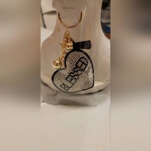 New in package blessed rhinestone black and silver keychain